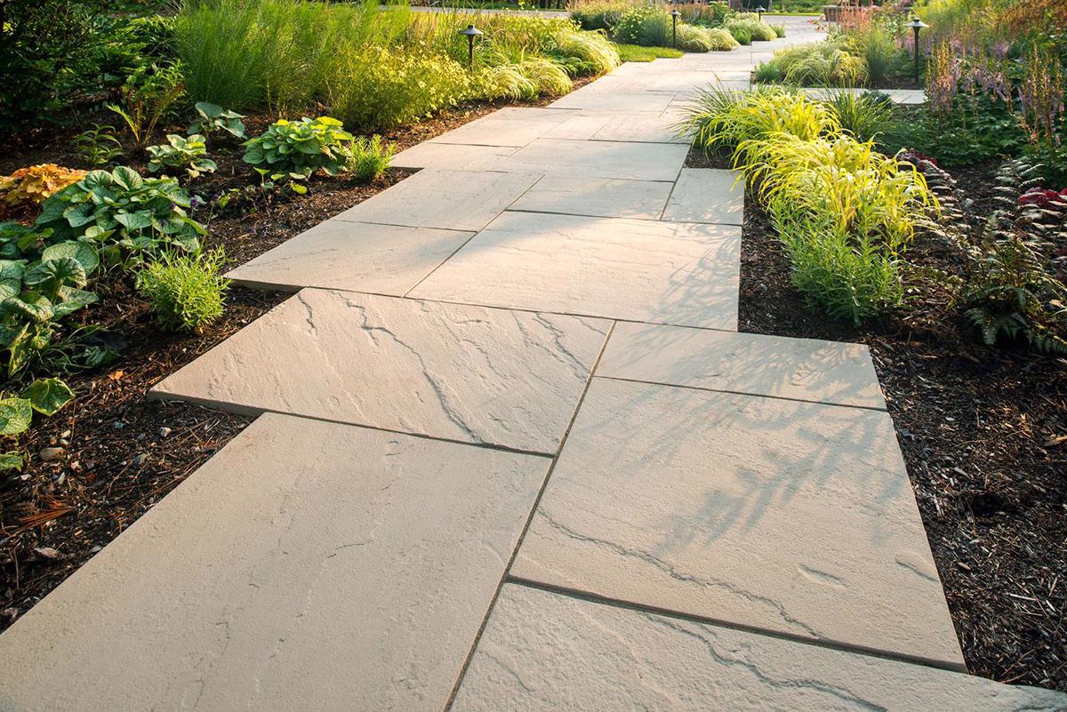 Techo-Bloc Aberdeen paver walkway with landscaped garden beds in Cicero, IL by Luxterra Outdoors