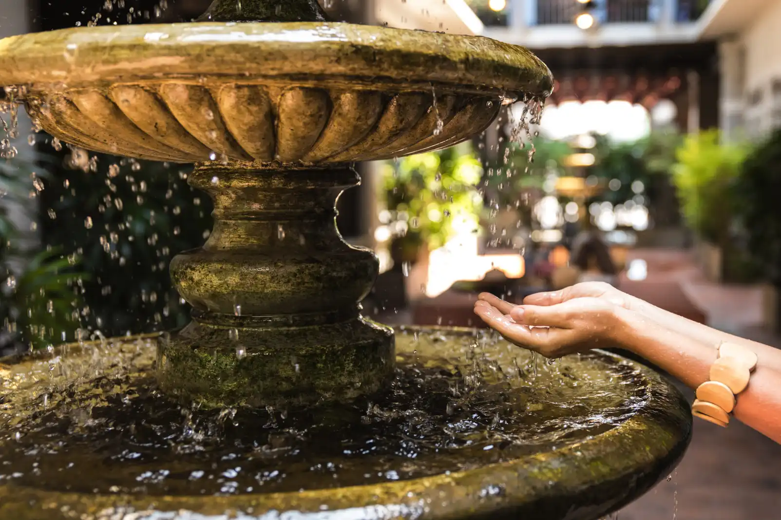 female hands ancient fountain with splashing water 2024 10 18 06 13 28 utc 1 1