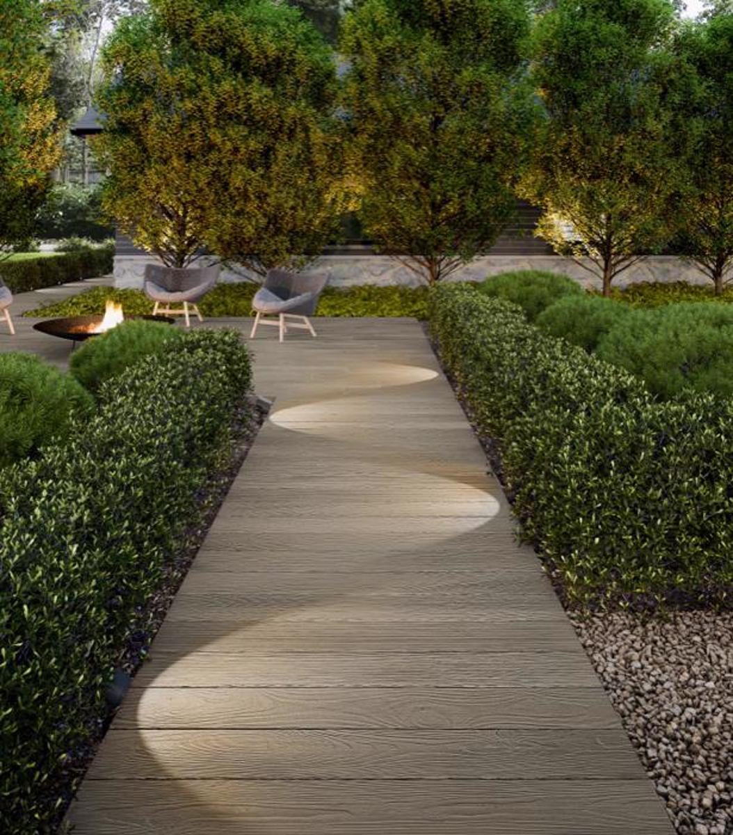 Traditional fire pit surrounded by landscaping. backyard remodeling in Naperville IL
